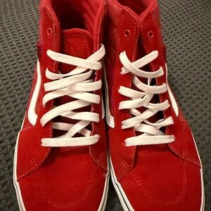 Red High-Top vans w